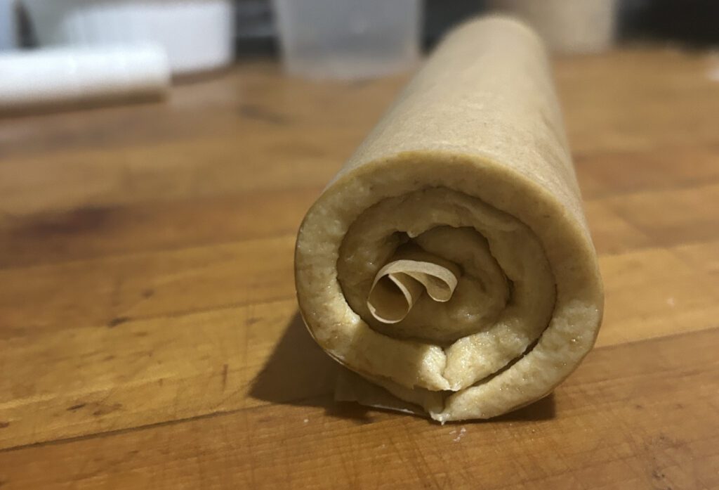 Freshly milled crescent dough rolled up and ready for another day