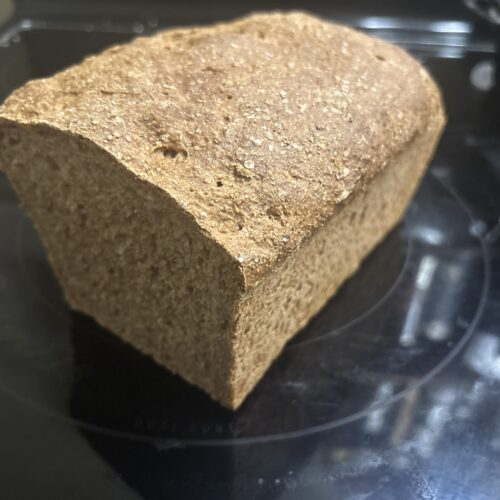 A loaf of freshly milled, whole grain spelt bread